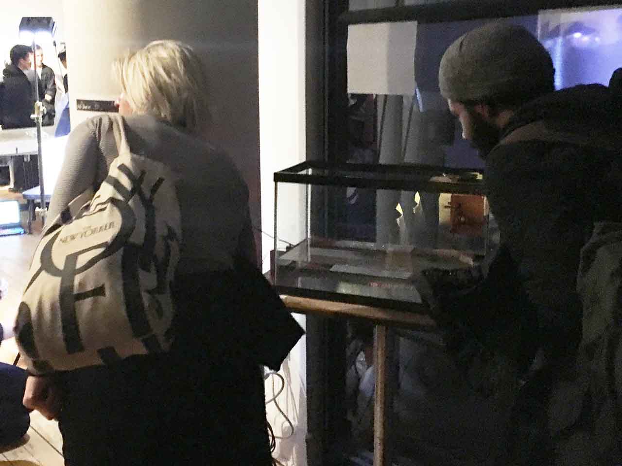 Image of two people talking and listening to each other through an amplitude modulated analog optic transmission circuit